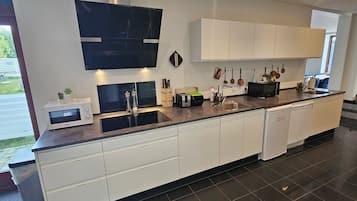 Fridge, electric kettle, high chair