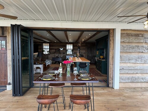 Historic Log Cabin fully restored; gourmet kitchen & much more!