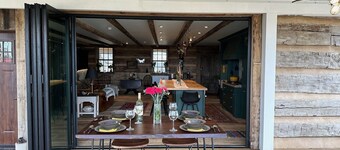 Historic Log Cabin fully restored; gourmet kitchen & much more!