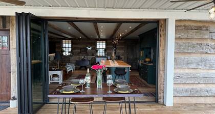 Historic Log Cabin fully restored; gourmet kitchen & much more!