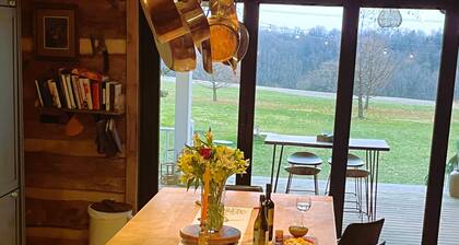 Historic Log Cabin fully restored; gourmet kitchen & much more!