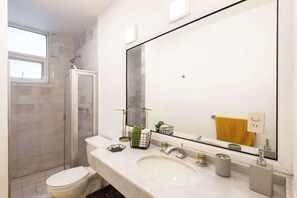 Shower, hair dryer, shampoo