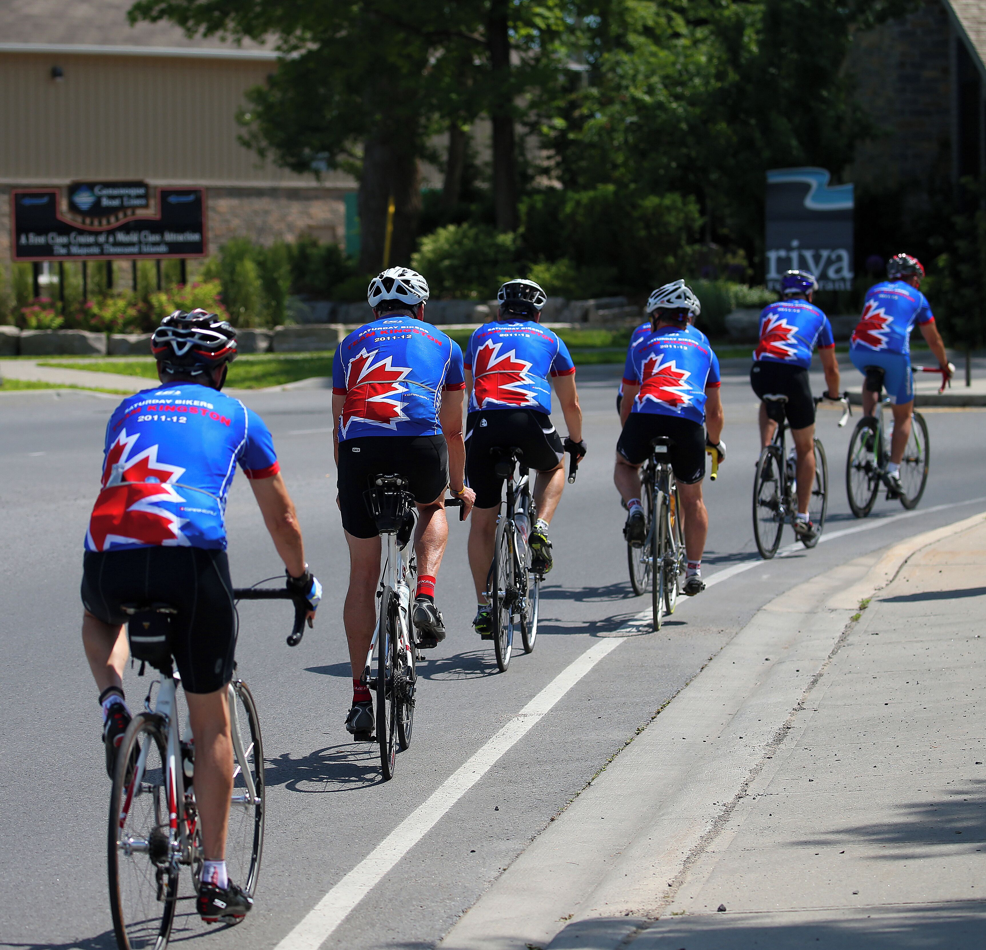 A group of cyclists on a road.