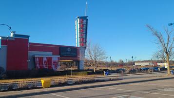 A building with a 'D2' sign, a tall tower with 'CASINO' signage, and a 'SHORELINE' banner.