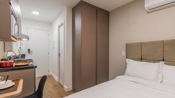 1 quarto, acesso à internet, roupa de cama