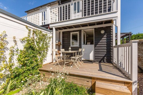 Boatswains Cottage is a charming two-bedroom cottage, close enough to the sea to hear the gulls.