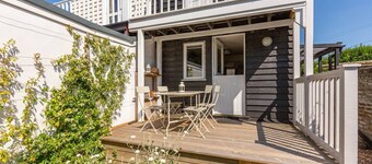 Boatswains Cottage is a charming two-bedroom cottage, close enough to the sea to hear the gulls.