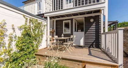 Boatswains Cottage is a charming two-bedroom cottage, close enough to the sea to hear the gulls.