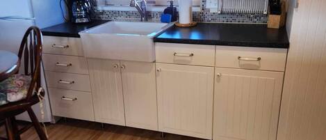 Fridge, microwave, coffee/tea maker, toaster