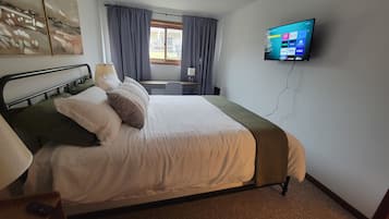 1 bedroom, desk, iron/ironing board, travel cot