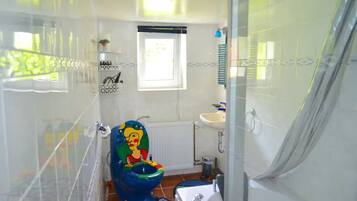 Shower, towels, toilet paper