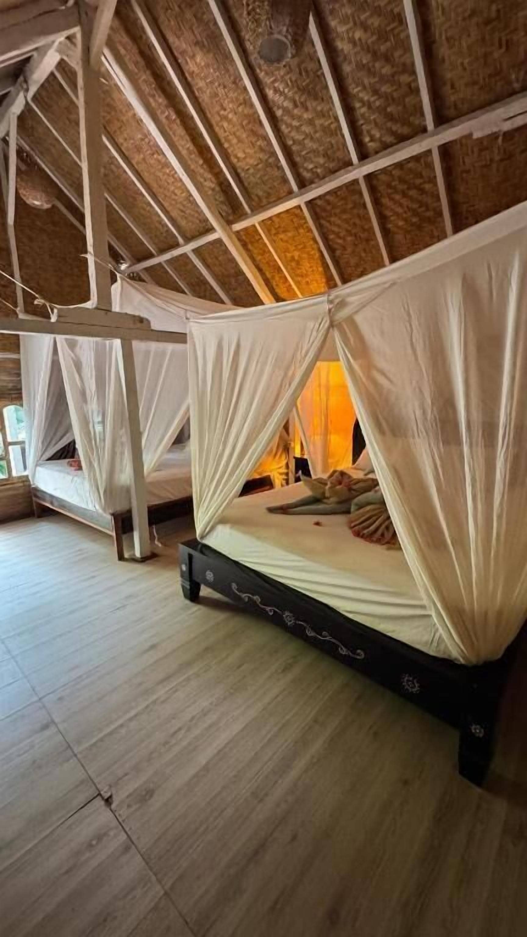 Premium bedding, desk, laptop workspace, rollaway beds