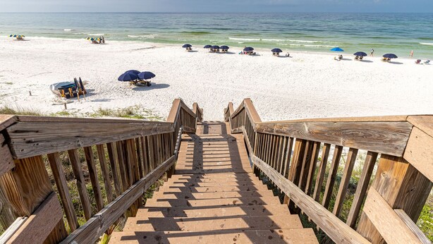 A wooden staircase leading to a beach with white sand and clear blue water. - Palms of Seagrove D5 -Private Beach Access, Bikes, Pool & 5 Min to Seaside (Seagrove Beach)