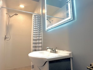 Hair dryer, towels, soap, toilet paper