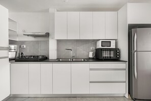 Apartment | Private kitchen | Fridge, microwave, oven, espresso maker