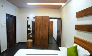Suíte executiva, vista para a cidade | Roupas de cama premium, edredons de pluma