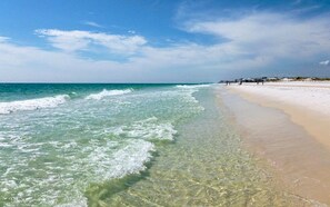 A beach with clear water and a sandy shore. - Featured on Destination Channel: Game Room, Bunk Room, Pool, Bikes & Free Tram (Santa Rosa Beach)