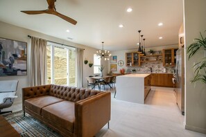 TV, fireplace, stereo, offices - The Q by Velo - Stylish Mid-Century Modern Home (Albuquerque)