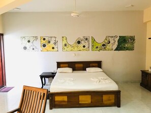 Chambre Deluxe Double ou avec lits jumeaux | Bureau, fer et planche à repasser, Wi-Fi gratuit