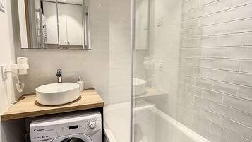 Hair dryer, towels, soap, shampoo