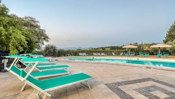 Seasonal outdoor pool, pool umbrellas