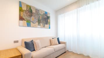 Chambre Quadruple Deluxe | Couette en duvet d'oie, matelas mémoire de forme