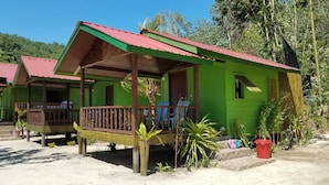 A green building with a red roof, a porch, and a small window. - The Beachaven Chalets Kota Belud (Kota Belud)