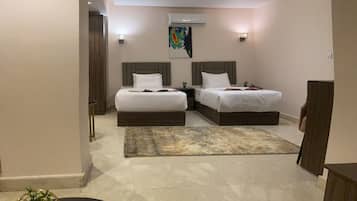 Junior Suite | 1 bedroom, premium bedding, minibar, in-room safe