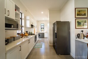 Private kitchen - VICTORIA FALLS HOUSE OF TWEEZA-Taken from the Shona word "Twiza"  means Giraffe (Victoria Falls)