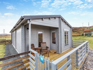 Exterior - Seashell Lodge is located in Gairloch with views over the sea and beyond. (Opinan, near Gairloch)