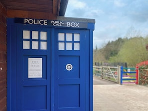 A police public call box with a sign indicating it is free for public use and provides advice and assistance.