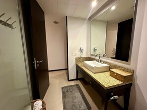 Shower, hair dryer, towels, soap