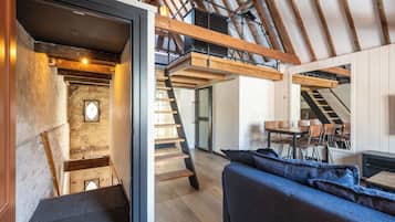 Family Loft, 1 King Bed with Sofa bed | Living area | 50-inch Smart TV with cable channels, Netflix, streaming services