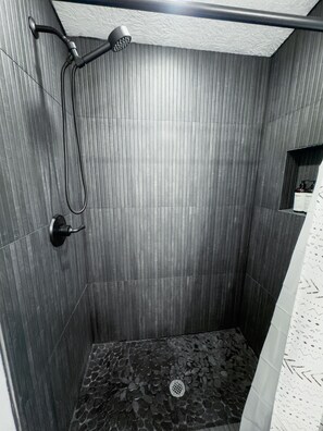 Shower, hair dryer, towels, soap