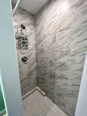 Hair dryer, towels, soap, shampoo