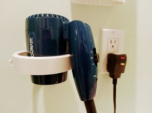 Hair dryer, towels, soap, shampoo