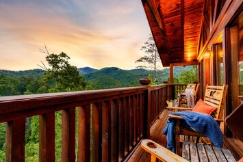 Have a seat in one of the rocking chair and enjoy the beautiful Mountain views!