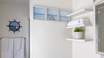 Shower, hair dryer, towels, soap