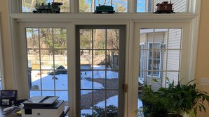A room with a large window, a desk with an HP printer, and a potted plant. - Saratoga retreat!  Great yard with inground pool.  4 miles from Racetrack. (Saratoga Springs)