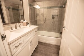 Hair dryer, towels, soap, shampoo