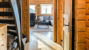 A wooden interior with a staircase, a sofa, and a coffee table. - 3 bedroom lovely home in Bjorli (Bjorli)