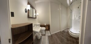 Shower, towels, toilet paper