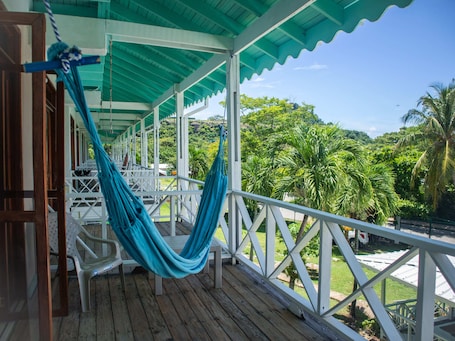 Comfort Single Room, 1 Large Single Bed, Smoking, Partial Ocean View | Balcony. South West Bay Cabañas