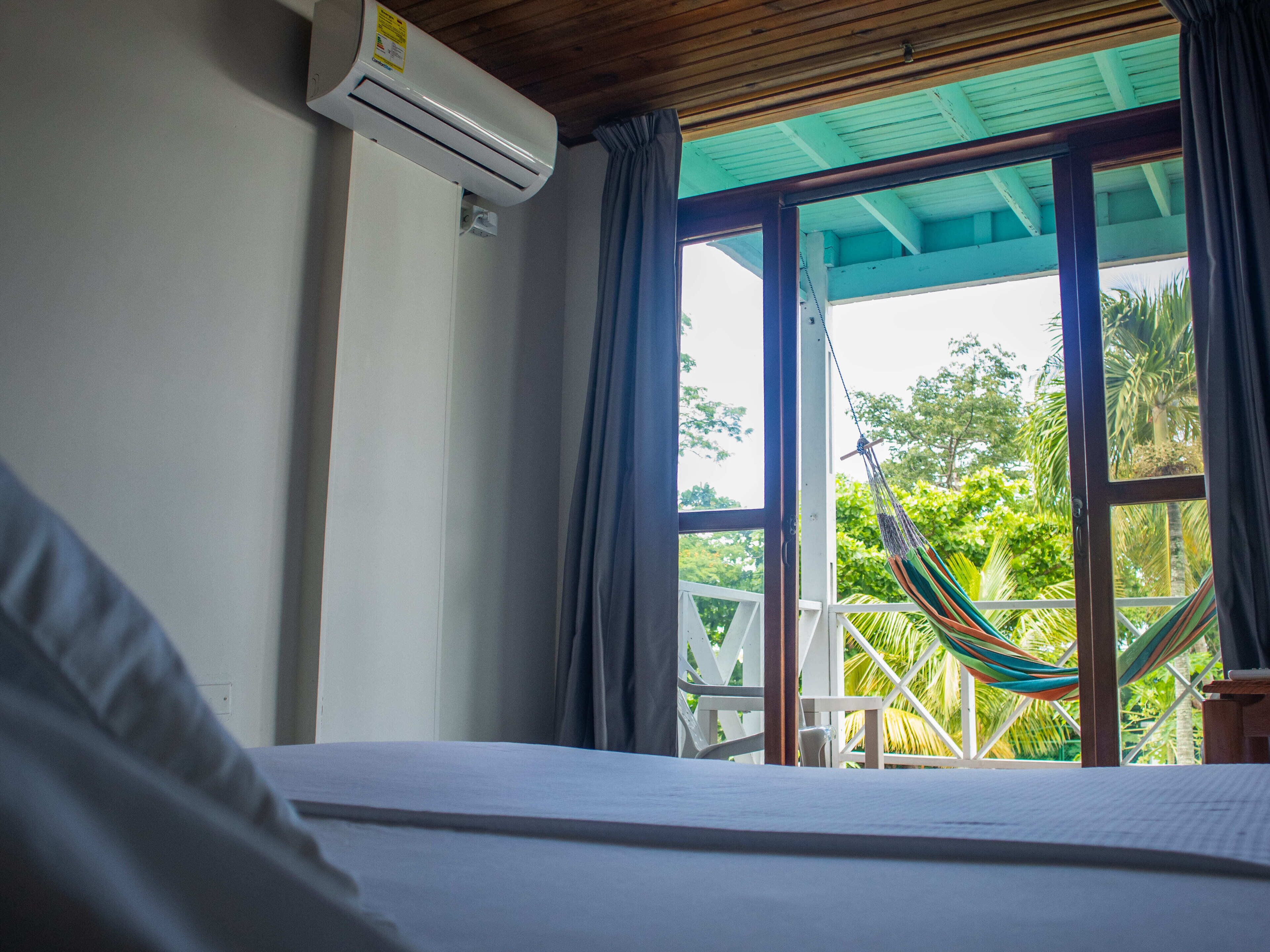 Basic Double Room, Multiple Beds | Minibar, bed sheets