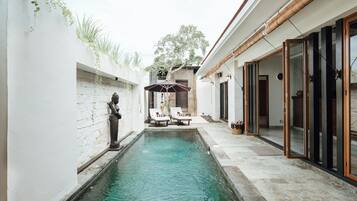 Outdoor pool, pool umbrellas, pool loungers