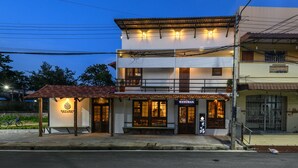 A two-story building with a restaurant named "HANUMAN" on the ground floor. - Hanuman Boutique Stay & Eatery (Hat Yai)