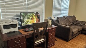 A home office with a desk, printer, computer, and a couch. - Wonderful 4B2.5B for Augusta Master Holiday (Evans)