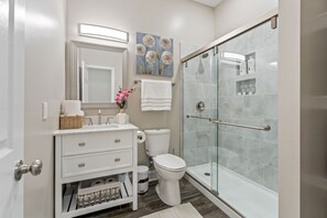 Shower, hair dryer, towels, soap