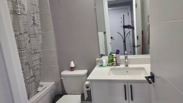 Hair dryer, towels, soap, shampoo