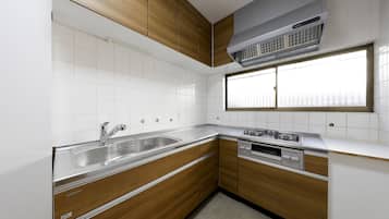 Villa | Private kitchen | Full-size fridge, microwave, stovetop, electric kettle